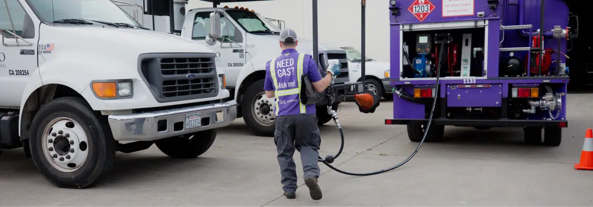 Man-Fueling-Diesel-Truck-Purple-Tanker