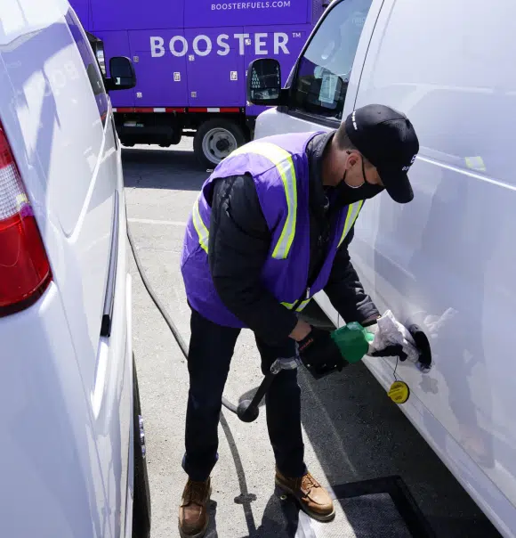 man fueling fleets
